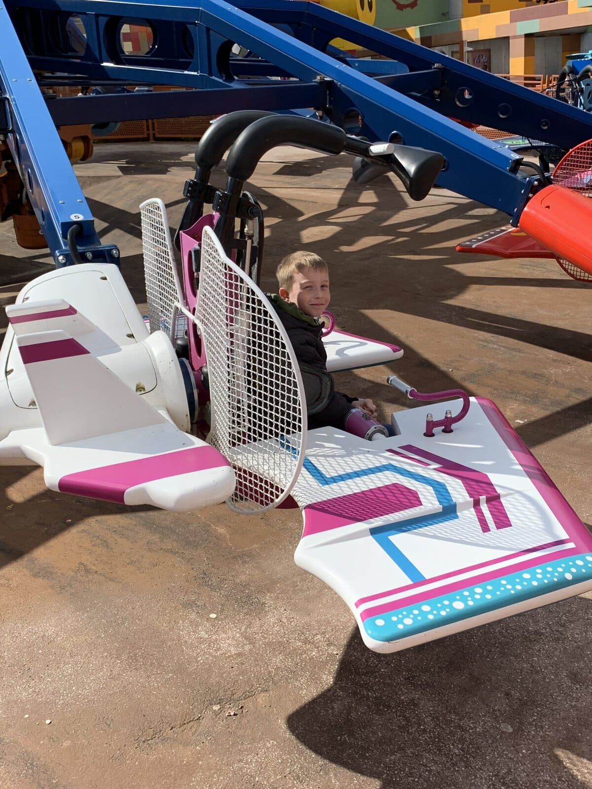 Boy sat on a LEGOLAND Billund Ride