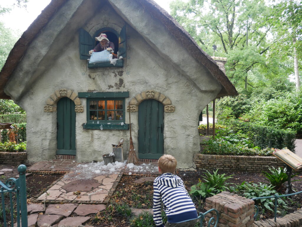Child looking at a building from one of the fairytales