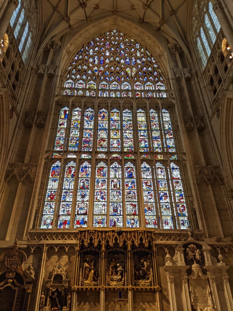 View of a large stained glass window inside York Minster