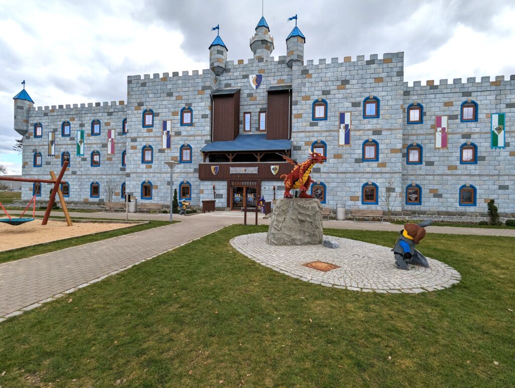 front of the legoland castle hotel in Billund Denmark with LEGO sculptures