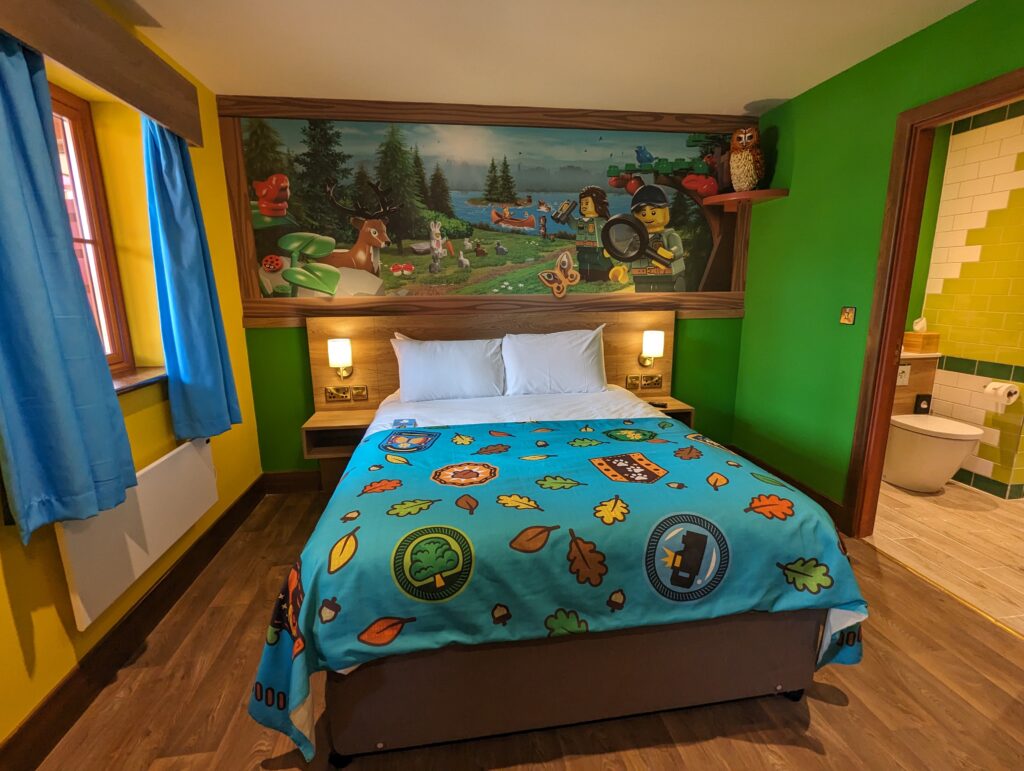 bedroom within the entrance of the woodland lodge