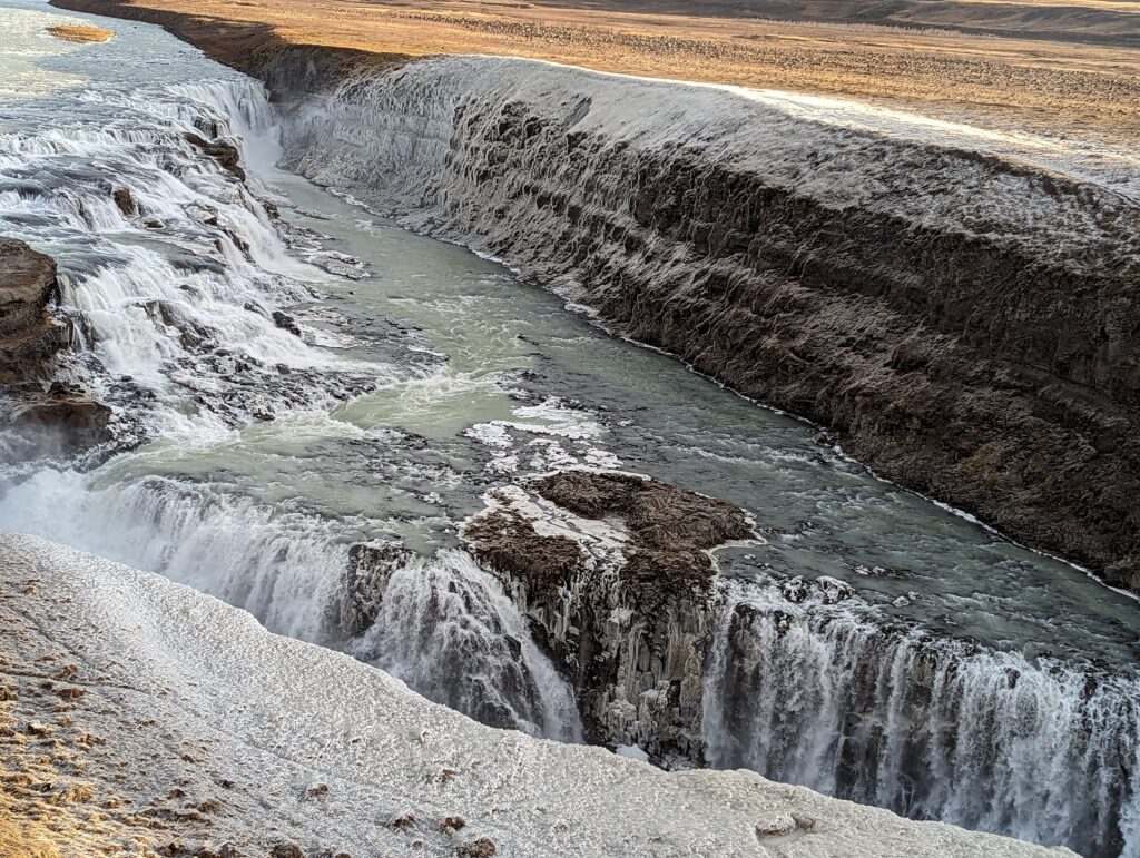 Gullfoss waterfall covered in snow and ice in Iceland