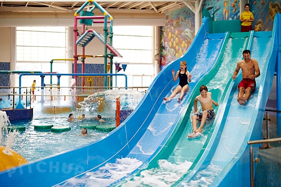 Children on the slides at the indoor pool Primrose Valley Haven