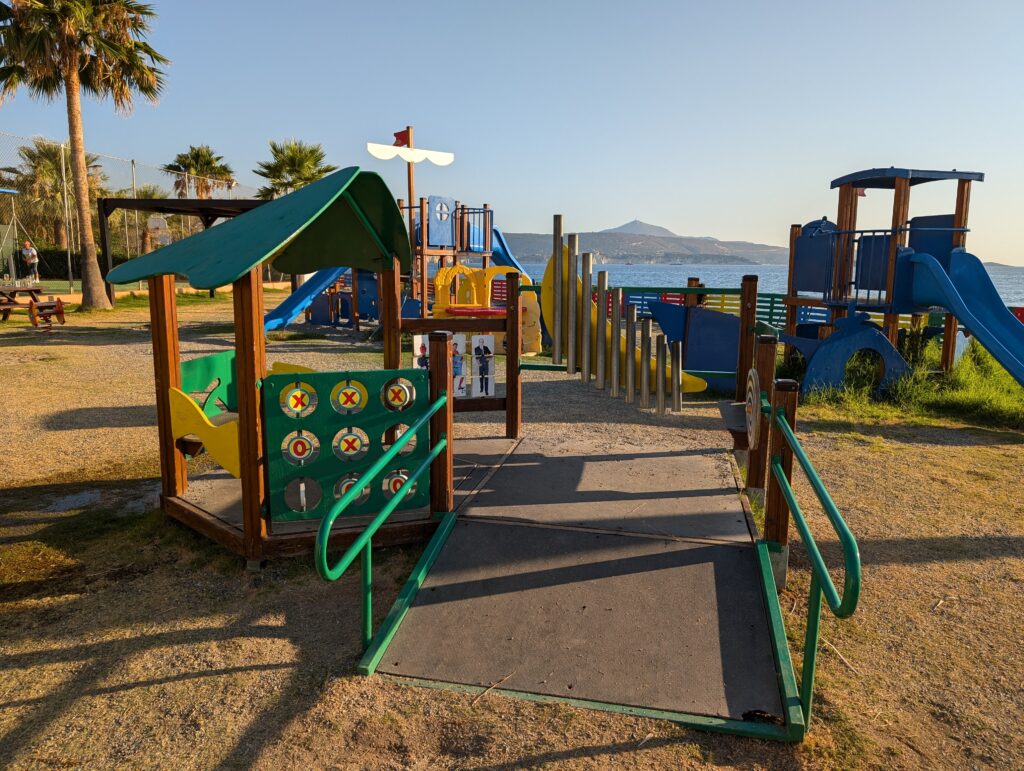 Children's play area outdoors at the Kiani Beach Resort
